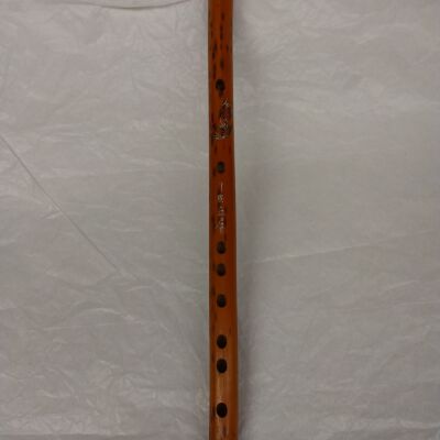 Bamboo flute with etching of fowl