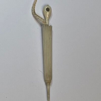 #6: Vegetable ivory carved umbrella needlecase with a very short handle that has a Stanhope 'peeps' insertion. A twisted cord has been added by a later user to keep the tool safe from loss.

Stanhopes are collectible souvenirs also known as 'peeps.'  The end of these tools have a miniature lens that magnifies micro-pictures. Lord Charles Stanhope (1753-1816) invented the tiny glass rods that were 0.26 cm in diameter and 0.65 cm in length. Advances in photography came during the second quarter of the 19th century, and René Dagron saw the possibilities of mass manufacturing novelty items using the microphotographs. Dagron was granted the first microfilm patent in France in 1859, he later took out a British patent, followed by a US patent.

Stanhope views depicted popular towns, resorts, spas, etc., making them wonderful souvenirs and keepsakes.
Collection