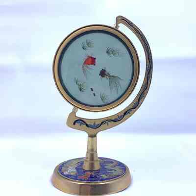 Double sided needle painted fish.