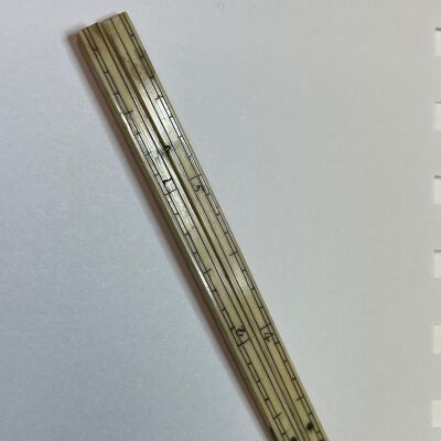 #2: Bone or Ivory folding ruler with silver sittings.   6"