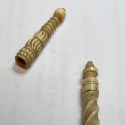 #4: Barber-pole carved handle with a ball at the bottom