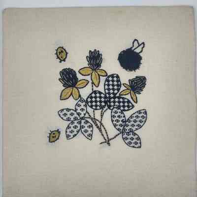 Blackwork and goldwork flowers