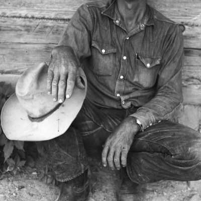 Weathered Hands in a Hard Land