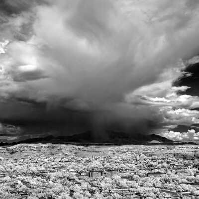 St. George overview with rain clouds over Pine Valley Mountains