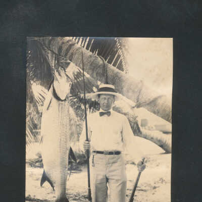 Visitor with Rod and Gun