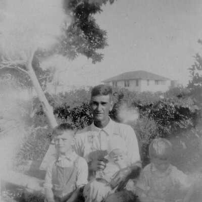 Capt Rodney holding baby