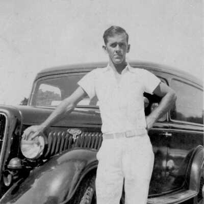 Louis Pellicier in front of car