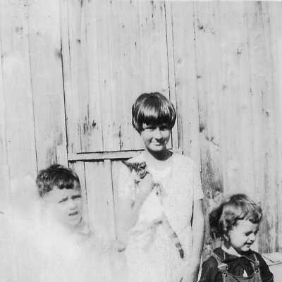 Marjorie holding kitten and family