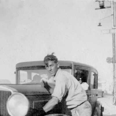 Louis Pellicier in front of car