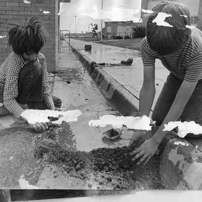 Kids Playing In Mud At Rick's Campus