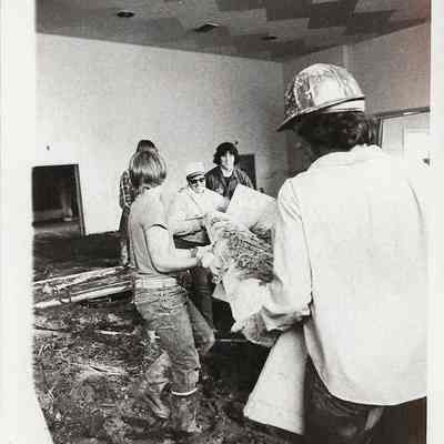 Crew Cleaning Out A Building