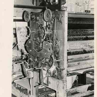 Closeup of flood damaged newspaper printer
