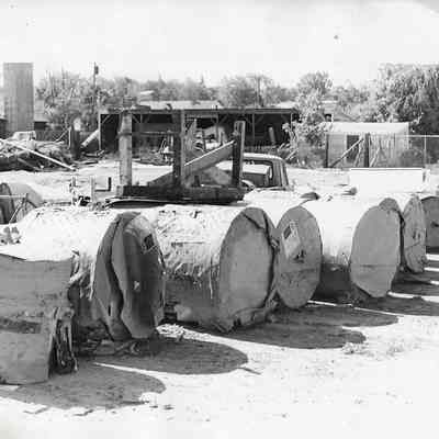 Row of Large Rolled Objects.