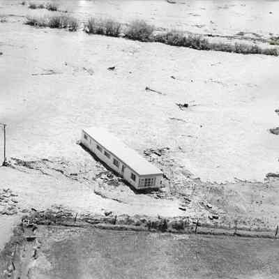 Trailer Home Being Carried By Flood Waters