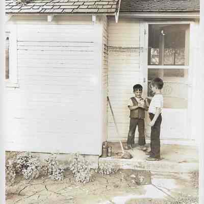 Boys Playing During Flood Cleanup