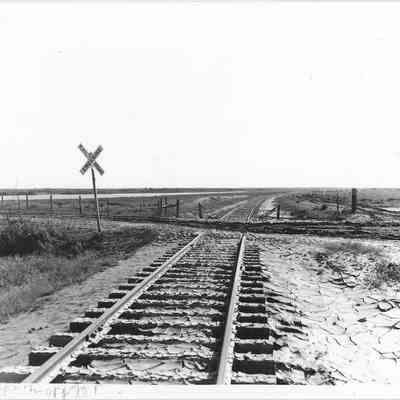 Railroad tracks with mud