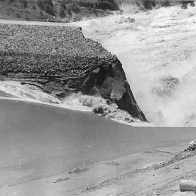 Reservoir Erupting Through Broken Dam