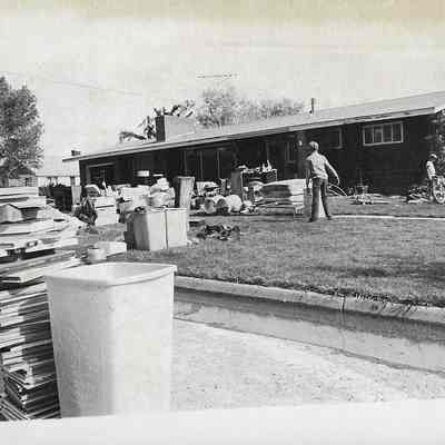 Family Possessions Stacked Outside Home