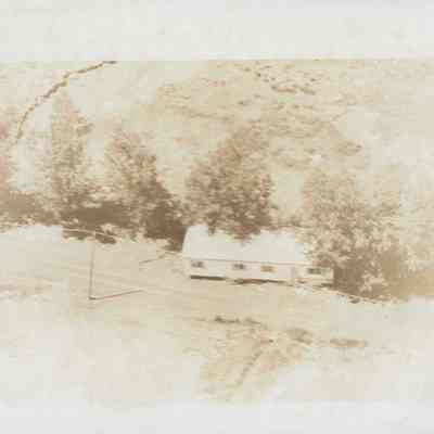 Roadside Home Deposited by Flood