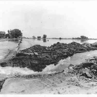 Washed out road with stream_sugar City