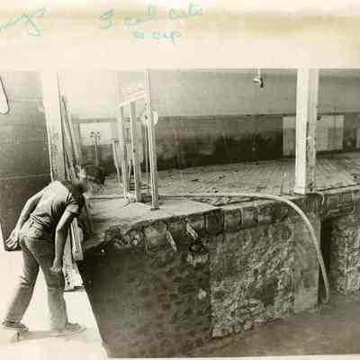 Boy viewing Flood Damaged Basement