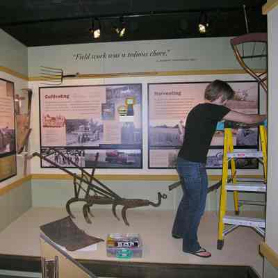 Martina Smith assisting with the Rural Way of Life Exhibit