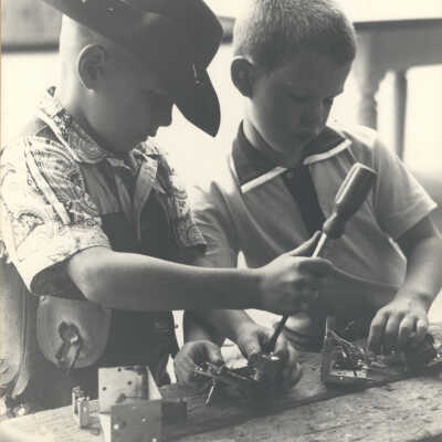 2 boys with a screwdriver