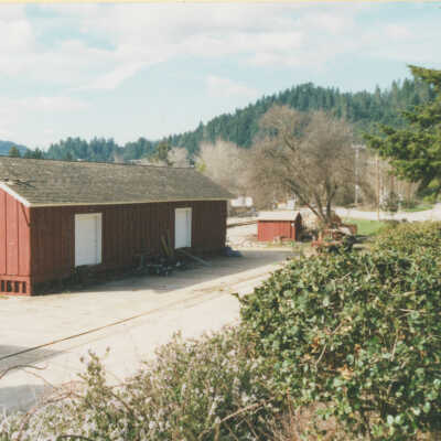 Route of S.P.C. and S.P. Railroads: A view in Roaring Camp of the original freight building at the Big Trees Station