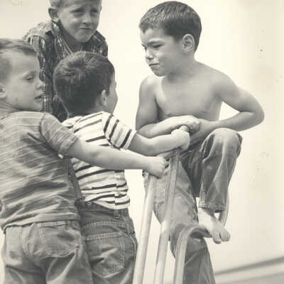 4 Boys on a ladder