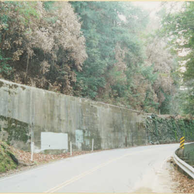 Route of S.P.C., S.P. and more recently the Santa Cruz, Big Tree & Pacific Railway: A view of the wall supporting a section of active track