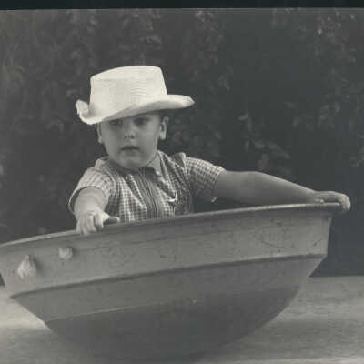 Boy in saucer