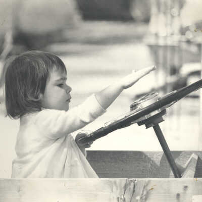 Girl in toy car