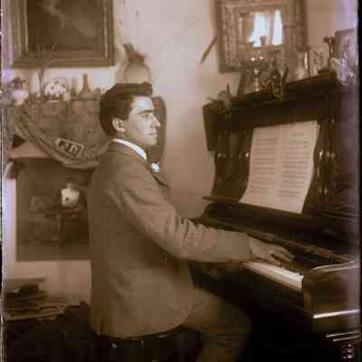Man in suit at piano