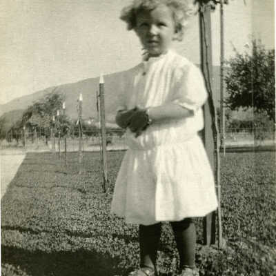 Mima standing on Broadway