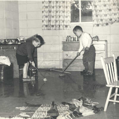 Boys mopping floor