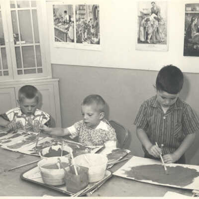 3 Boys painting