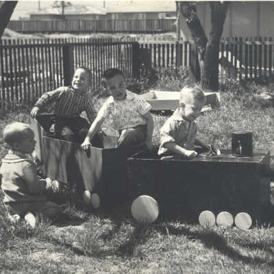 4 Boys on toy train