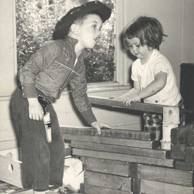 Boy and Girl building wooden structure