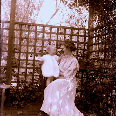 Lady seated with baby