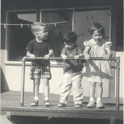 Children holding rail