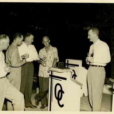Captain Arnold McKechnie Receiving Gifts at his Farewell Party