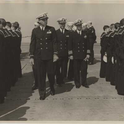 Captain Arnold W. McKechnie and Chief Boatswain George A. Lentz Inspect the Crew Aboard the USS Yorktown (CVA-10)