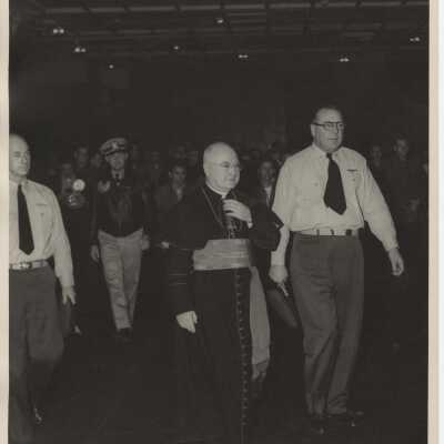 Captain McKechnie on the Hangar Deck with Cardinal Francis Spellman