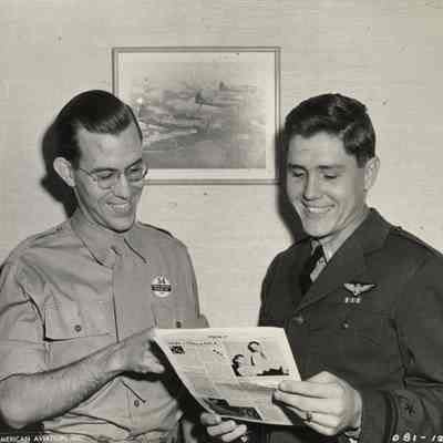 Elisha "Smokey" Stover Standing Alongside an Unidentified Official from North American Aviation