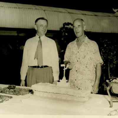 Captain Arnold McKechnie Tries His Farewell Party Cake