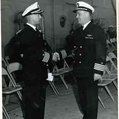 Captain McKechnie takes command of the USS Yorktown (CVA-10).
