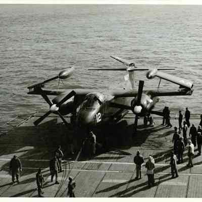 A North American AJ Savage sitting on one of the Yorktown's aircraft elevators.