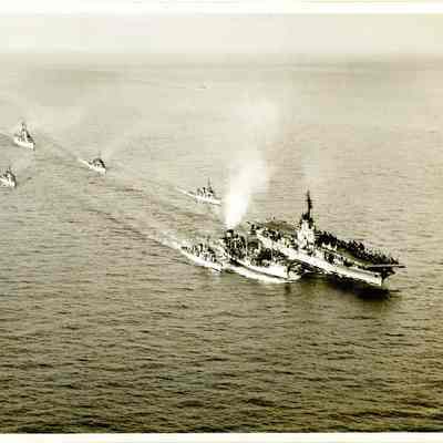 USS Yorktown (CVA-10) and USS Daly (DD-519) Being Refueled by a Supply Ship.