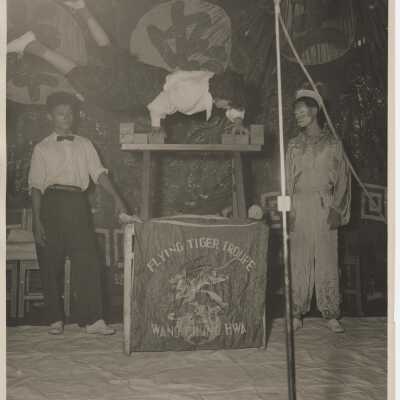 Flying Tiger Troupe Performs Acrobatics Aboard the USS Yorktown (CVA-10)