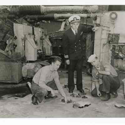 Captain Becton and his Men Inspect the Damage